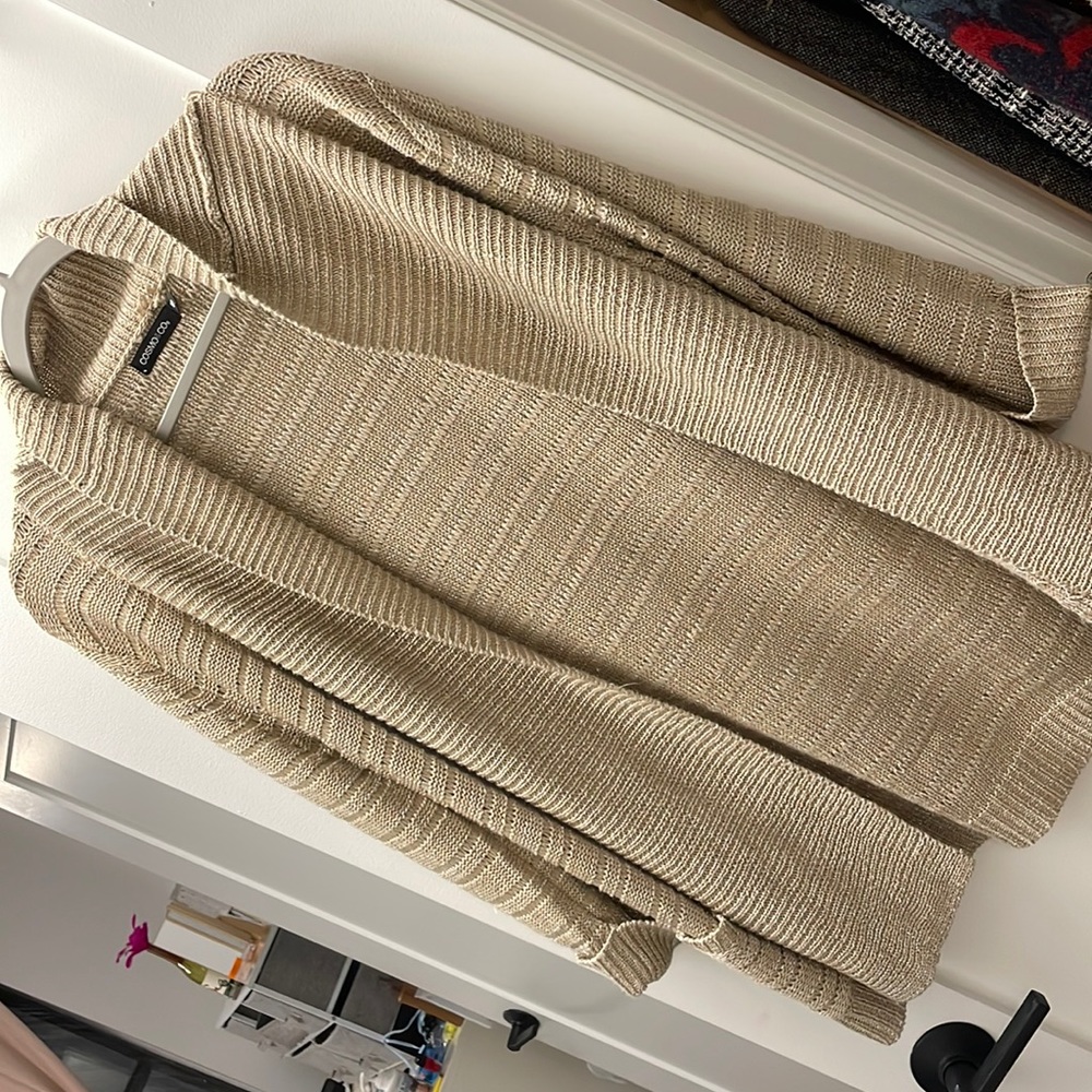 Long, golden sweater